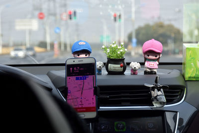 Close-up of laptop on car windshield