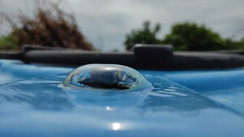 Close-up of water drops on swimming pool