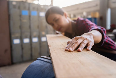 Close-up of woman working on table