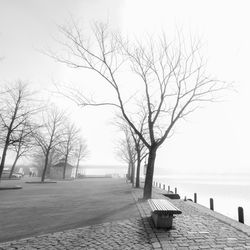 Empty parking lot by lake