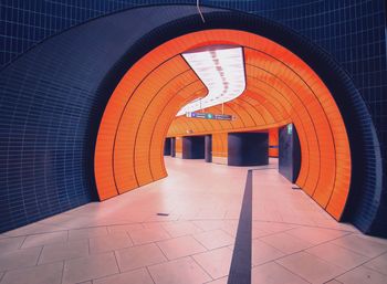 Illuminated tunnel at subway station