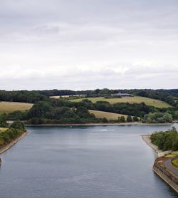 Scenic view of river against sky