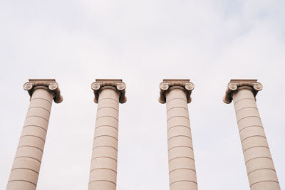 Low angle view of smoke stack against sky