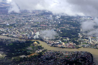 Aerial view of river amidst city