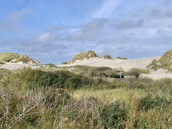 Scenic view of land against sky