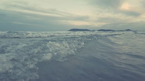 Scenic view of frozen landscape against sky