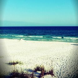 Scenic view of sea against clear sky