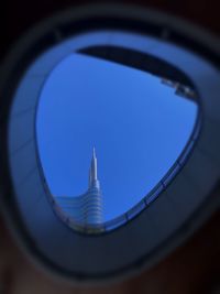 Low angle view of building against clear blue sky