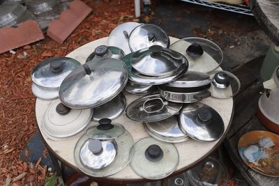 Selection of old stainless steel pot lids