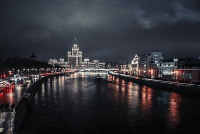 Illuminated buildings at waterfront