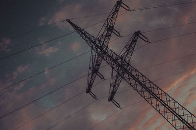 Low angle view of electricity pylon