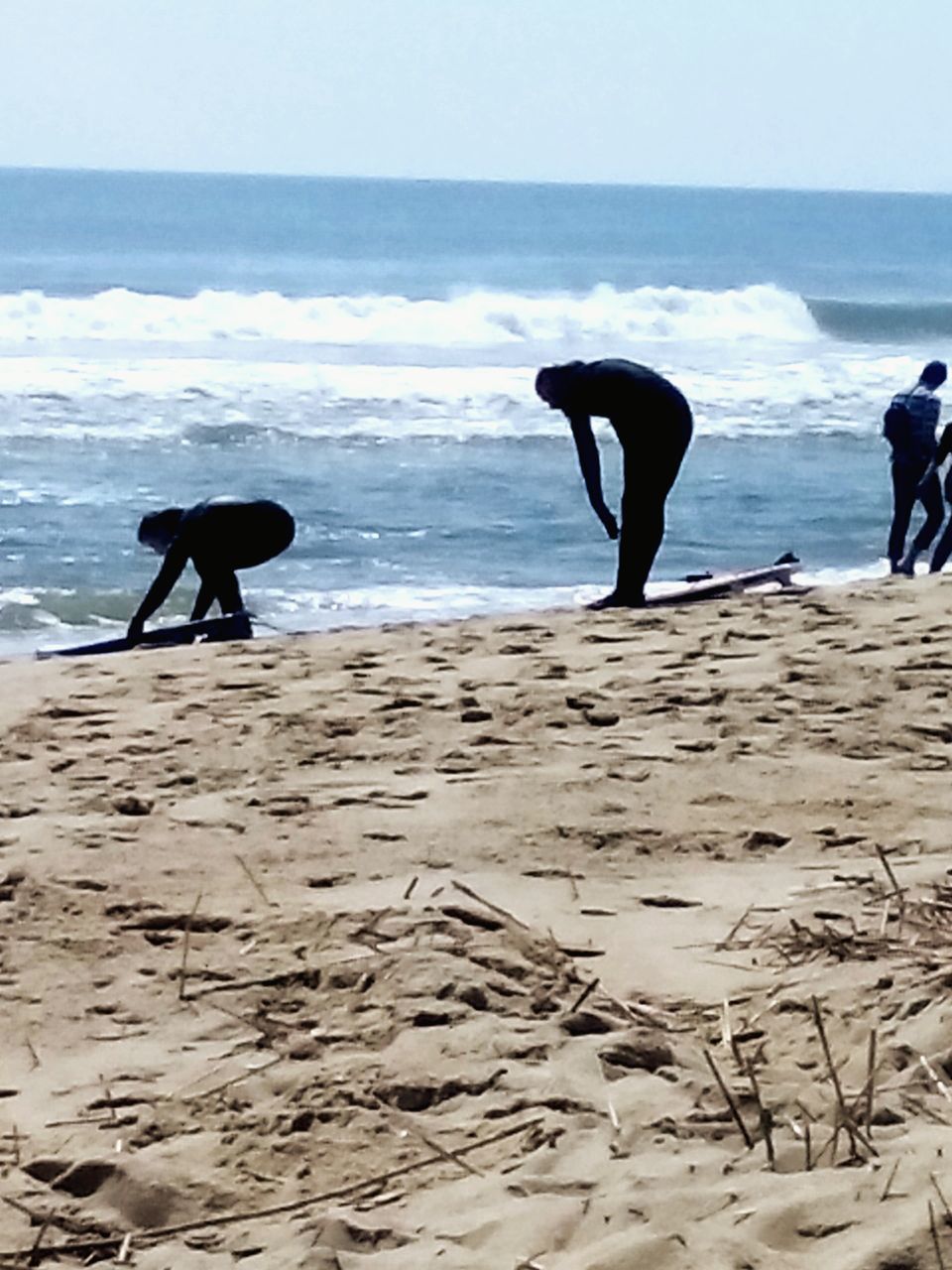 sea, beach, water, shore, sand, horizon over water, wave, silhouette, men, full length, walking, leisure activity, lifestyles, rear view, standing, nature, surf, scenics