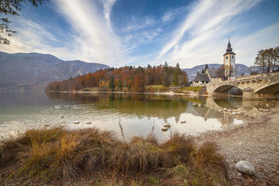 Scenic view of lake against sky during autumn