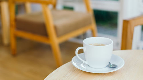 Close-up of tea cup on table