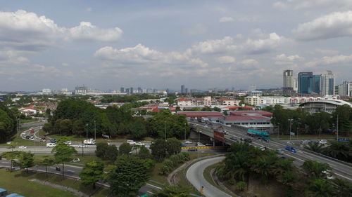 Aerial view of cityscape against sky