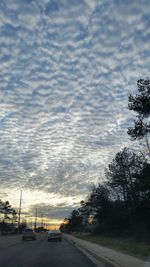 Road against cloudy sky