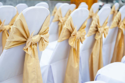 Ribbons on chair during ceremony