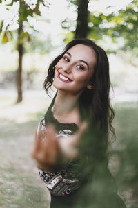 Portrait of smiling young woman