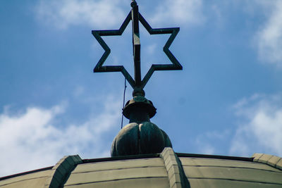 Low angle view of statue against sky