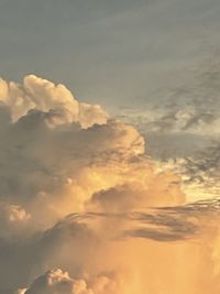 Low angle view of clouds in sky during sunset