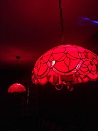 Close-up of illuminated lanterns hanging from ceiling