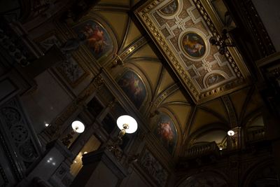 Low angle view of illuminated ceiling of building