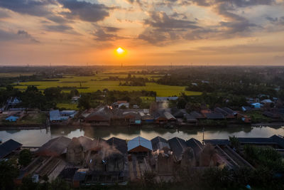 High angle view of townscape against sky during sunset