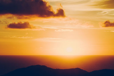 Scenic view of sunset over sea