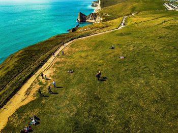 High angle view of people on cliff