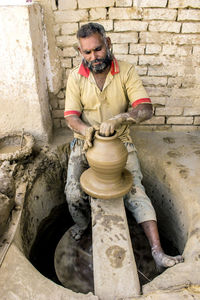 Man working in mud