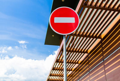 Road sign travel prohibited on a background of blue sky