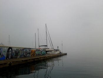 Ship in water against sky