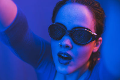 Close-up portrait of boy wearing sunglasses