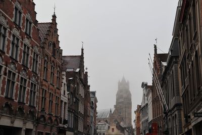 Panoramic view of buildings in city against sky