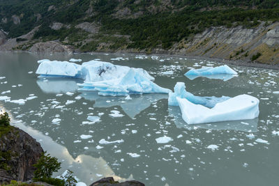 Ice floating on water in lake