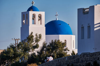 Church of agios gerasimos with its blue dome - firostefani, santorini, greece