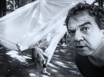 Close-up portrait of man standing outdoors