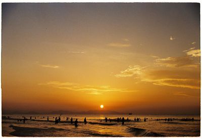 Scenic view of sea at sunset