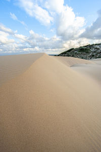 Scenic view of desert against sky