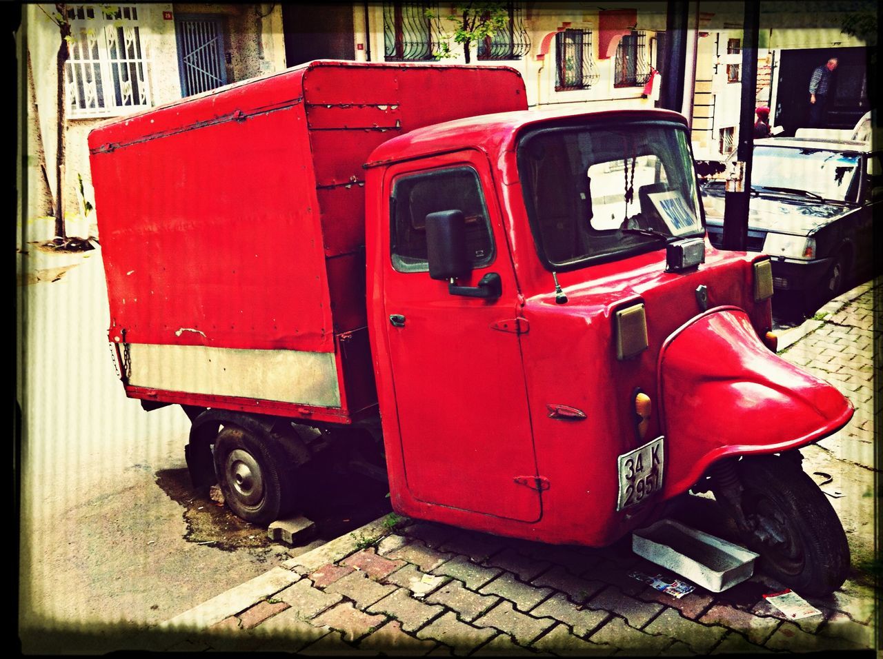 transportation, land vehicle, mode of transport, car, red, transfer print, stationary, auto post production filter, parking, parked, street, outdoors, day, no people, travel, vehicle, abandoned, side view, seat, sitting