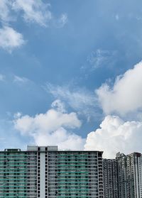 Low angle view of modern building against sky