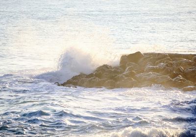 Waves splashing on shore