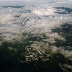 Aerial view of agricultural landscape against sky