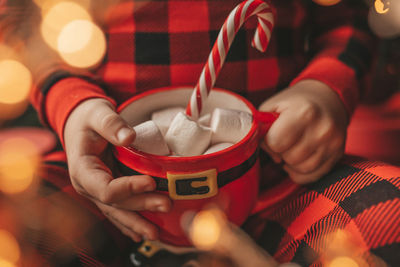 Cropped hand of person holding ice cream