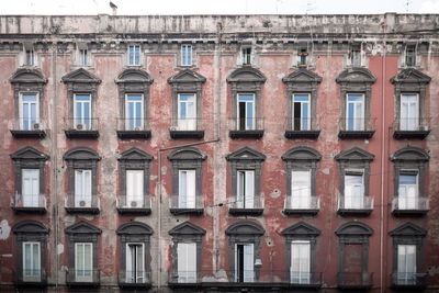 Windows of old building in city