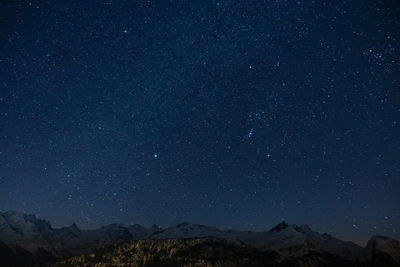 Low angle view of star field against sky at night