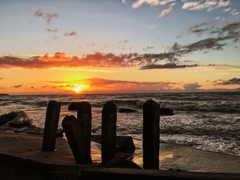 Scenic view of sea against sky during sunset