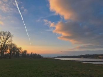 Scenic view of landscape against sky during sunset