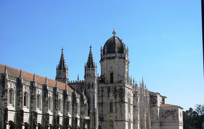 Low angle view of historic building against clear sky