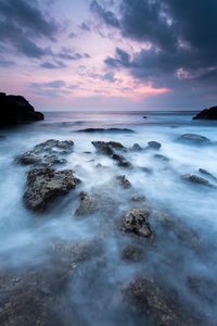 Scenic view of sea against sky during sunset